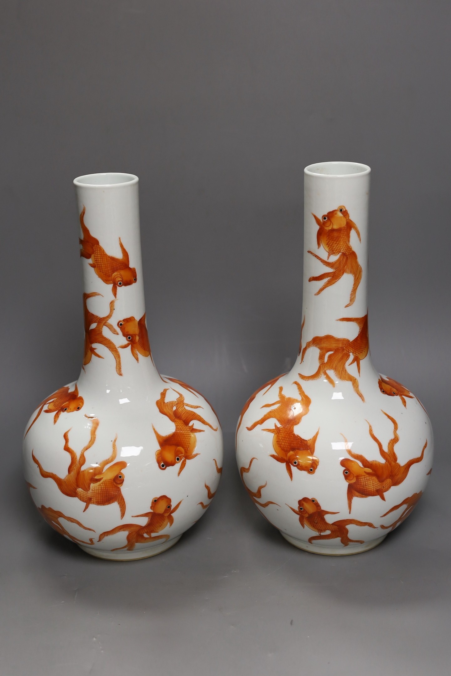 A pair of Chinese ‘goldfish’ bottle vases, 35cm